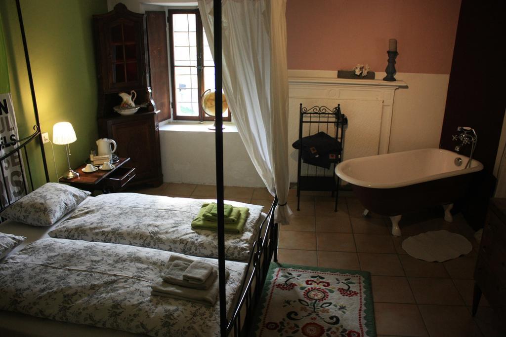 Affittacamere Casa Archi Losone Habitación foto