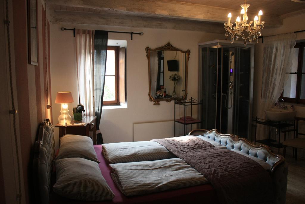 Affittacamere Casa Archi Losone Habitación foto
